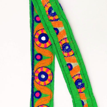 Green Mirrored Fabric Trim With Orange, Yellow, Blue And Pink Embroidery